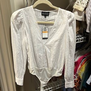 Danielle Bernstein body suit - never worn